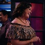 Debra Palmer’s leopard print off shoulder dress on Matlock