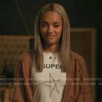 Ava’s Super Star tee and orange cardigan on High Potential