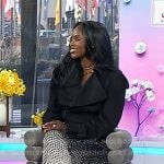 Eni Popoola’s black trench jacket and print balloon pants on Today