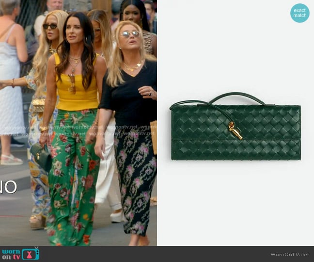 Bottega Veneta Andiamo Clutch in Emerald green worn by Kyle Richards on The Real Housewives of Beverly Hills