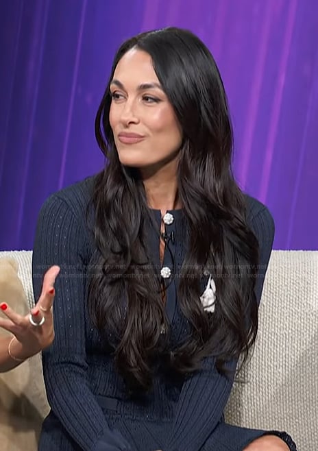Brie Garcia’s navy knit mini dress on Access Hollywood