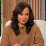 Judy Reyes’ brown sequin sweater on Sherri