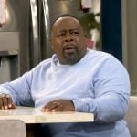 Calvin’s light blue sweatshirt on The Neighborhood