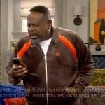 Calvin's brown and orange velour track suit on The Neighborhood