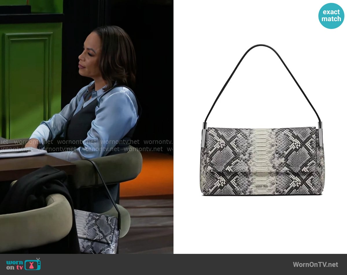 Calvin Klein Verne Flap Demi Shoulder Bag worn by Nicole Dupree Richardson (Daphnee Duplaix) on Beyond the Gates