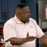 Calvin’s pink printed polo shirt on The Neighborhood