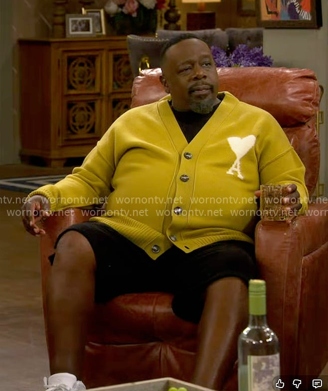 Calvin's mustard yellow cardigan with heart on The Neighborhood