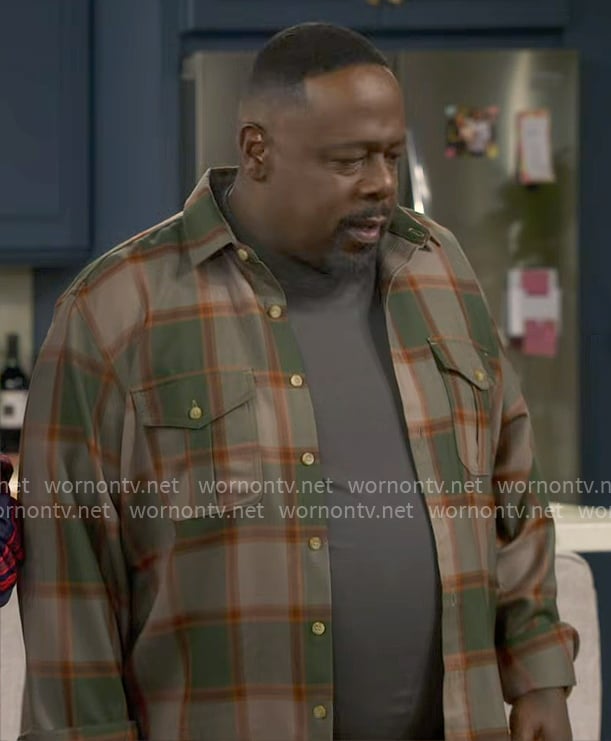 Calvin's olive plaid shirt on The Neighborhood