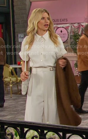 Cat’s white short sleeve shirt and belted pants on Days of our Lives