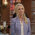 Christine’s blue blazer with gold button sleeves on The Young and the Restless