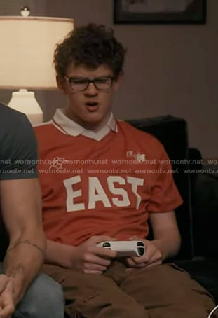 Christopher's red EAST print tee on 9-1-1