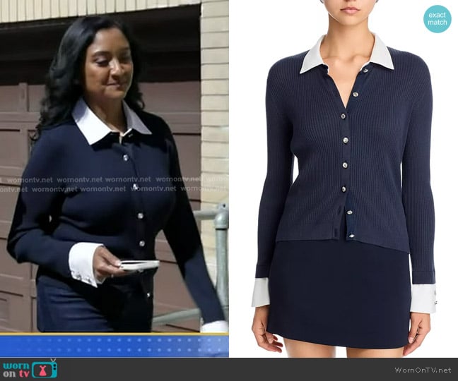 Miriam Daniel’s navy collared cardigan on GMA