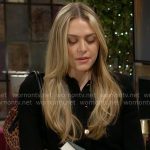 Claire’s black top with gold buttons and leopard bag on The Young and the Restless