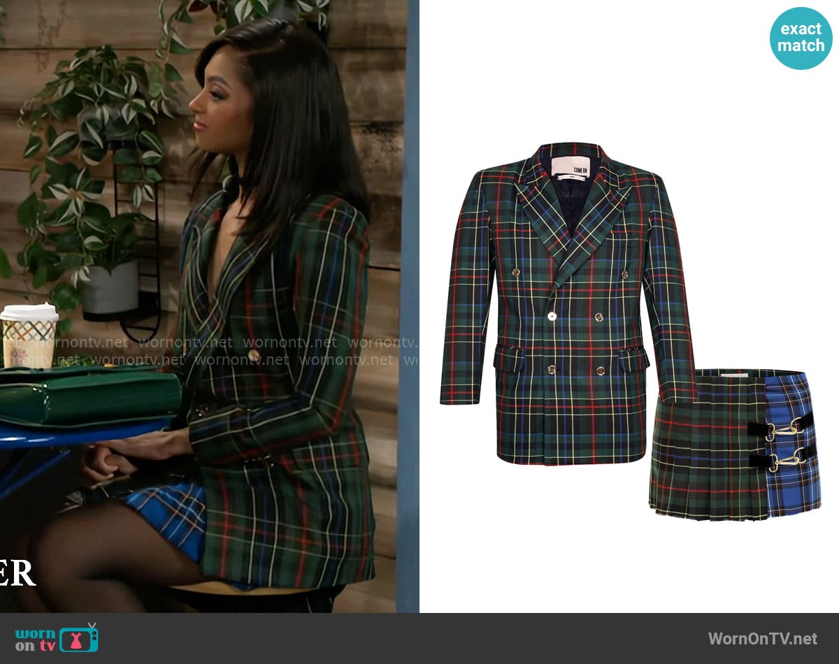 Kat’s green plaid blazer and skirt set on Beyond the Gates