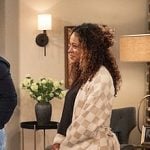 Courtney's checkerboard robe on The Neighborhood