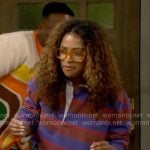 Courtney’s purple and red striped rugby top on The Neighborhood