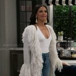 Dani’s white fringed long cardigan on Beyond the Gates