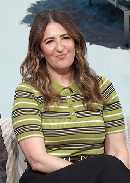 D’Arcy Carden’s green striped polo on Access Hollywood