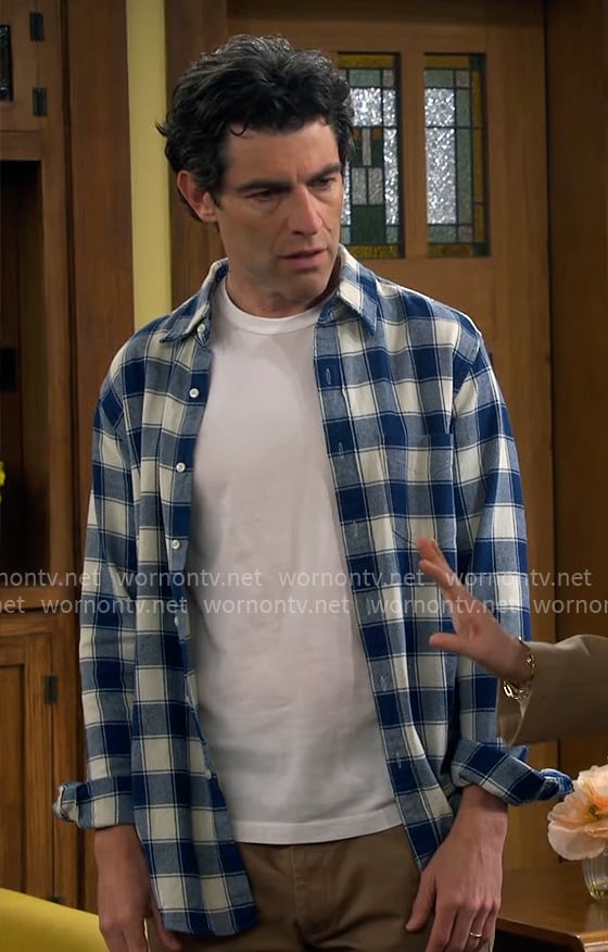 Dave's blue checked shirt on The Neighborhood