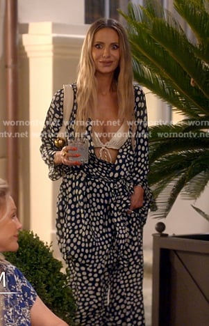 Dorit’s navy polka dot jacket and pants on The Real Housewives of Beverly Hills