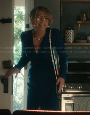 Dorothy’s teal twist front dress on Scarpetta