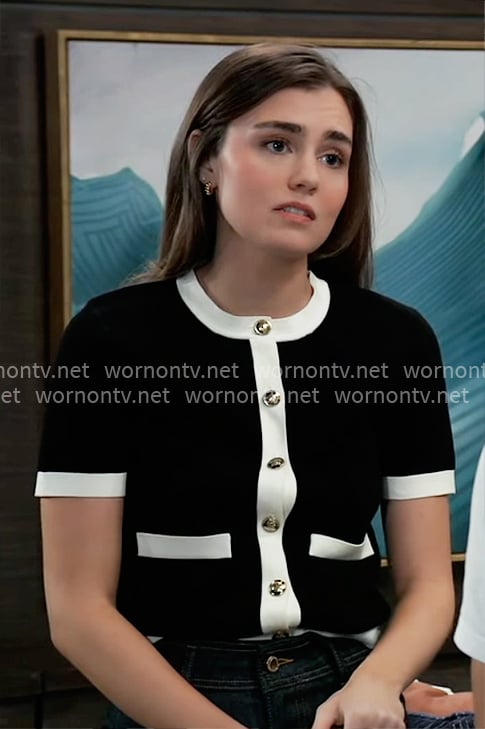 Emma’s black short sleeve cardigan with white trims on General Hospital