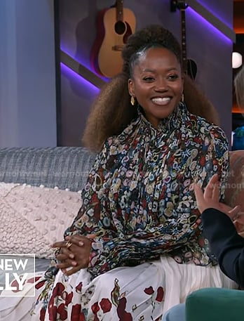 Erika Alexander’s floral gathered blouse and pleated skirt on The Kelly Clarkson Show