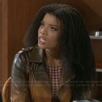 Eva’s brown ombre leather jacket and checked top on Beyond the Gates