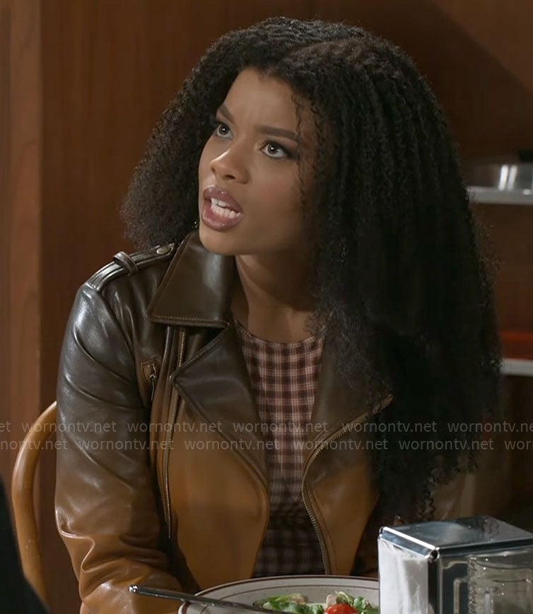 Eva’s brown ombre leather jacket and checked top on Beyond the Gates