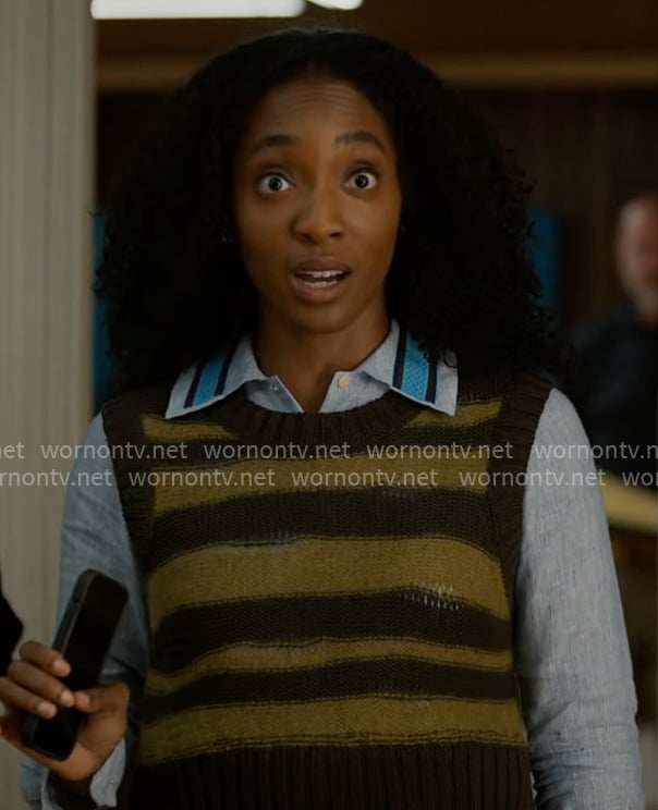 Faith's olive striped sweater vest and blue shirt on Will Trent