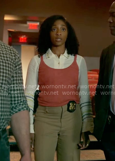 Faith's white embroidered shirt and coral tank top on Will Trent
