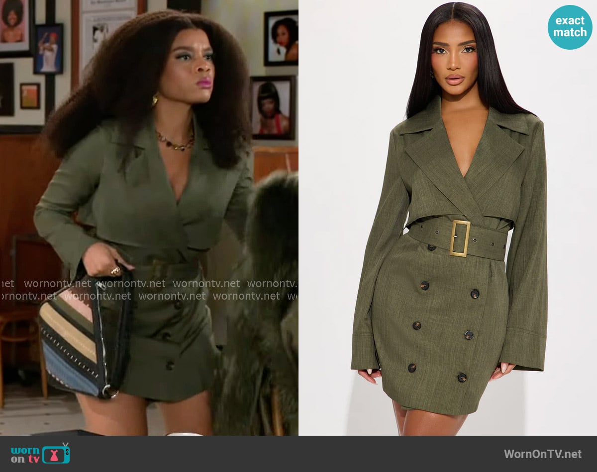 Eva’s green trench dress on Beyond the Gates