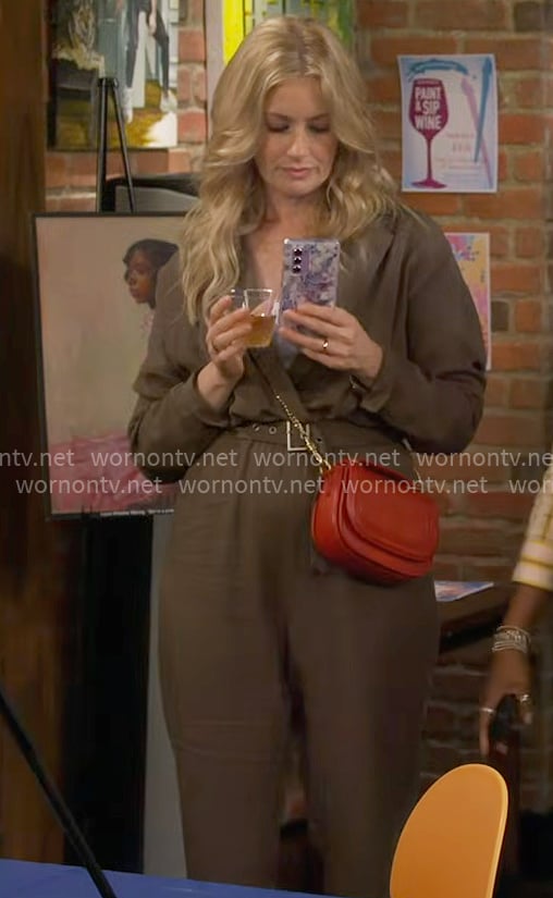 Gemma’s olive jumpsuit on The Neighborhood