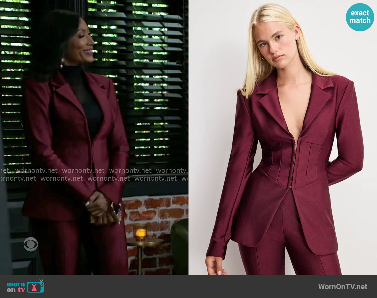 Good American Dolly Compression Shine Corset Blazer in Fig worn by Dana 'Leslie' Thomas (Trisha Mann-Grant) on Beyond the Gates