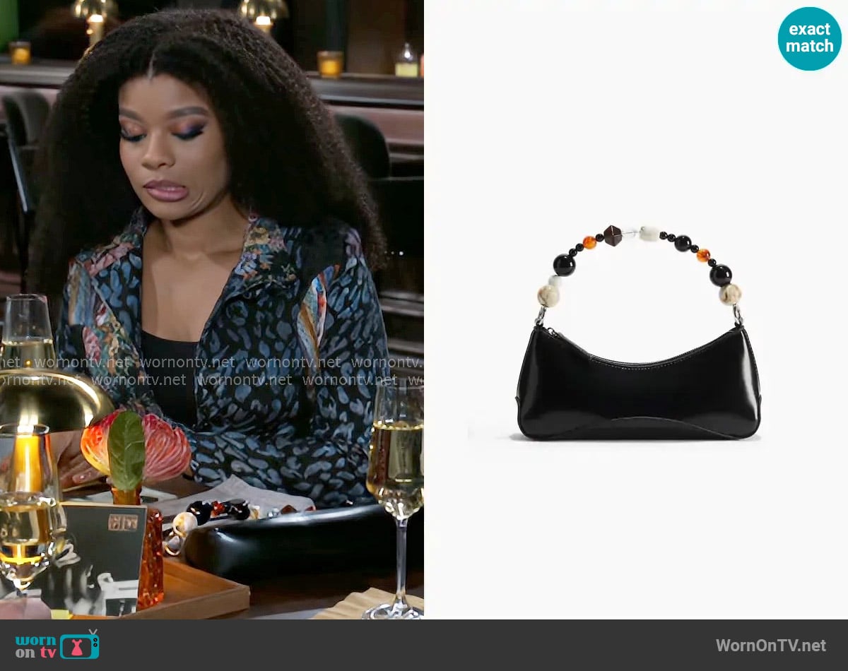 H&M Beaded-Strap Shoulder Bag worn by Eva Thomas (Ambyr Michelle) on Beyond the Gates
