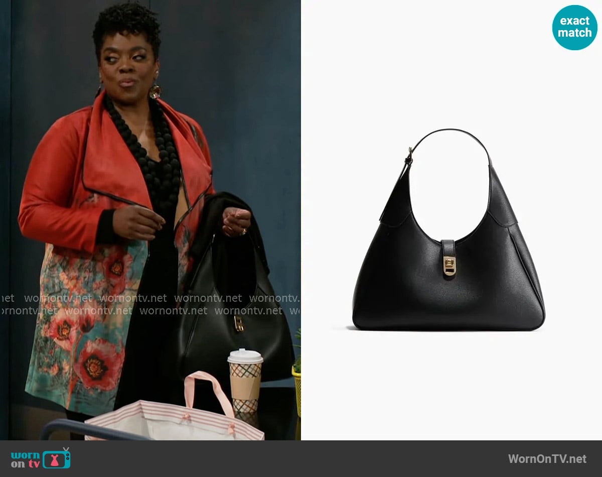 H&M Triangular Shoulder Bag worn by Mona Wilson (Karan Kendrick) on Beyond the Gates