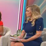 Kelly O’Grady’s dark blue puff-sleeve dress on CBS Mornings