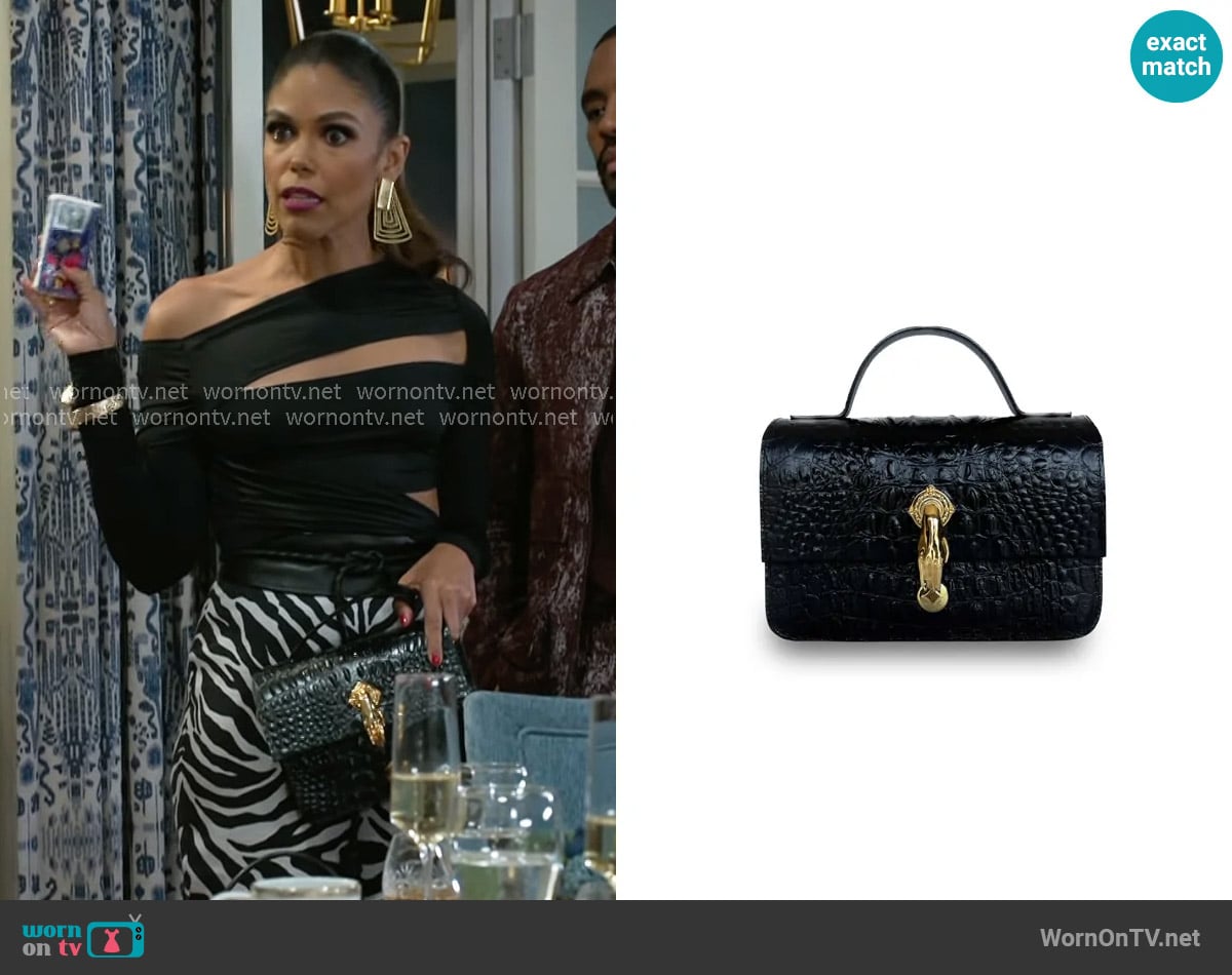 Indigolush Midi Classic Gl Black Bag worn by Dani Dupree (Karla Mosley) on Beyond the Gates