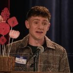 Jacob’s check print jacket on Abbott Elementary