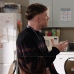 Jacob’s black stripe sweater on Abbott Elementary