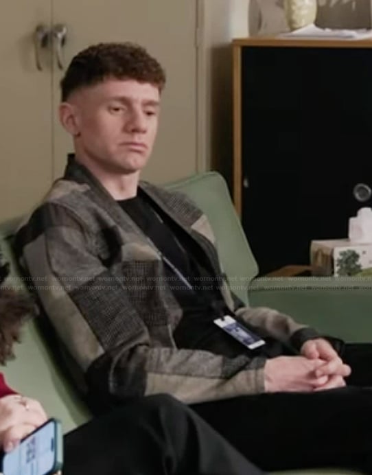 Jacob’s check print jacket on Abbott Elementary