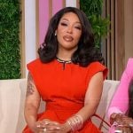 Kimberly’s red crop top and pants on Sherri