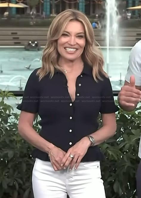 Kit’s black ruffle sleeve top on Access Hollywood