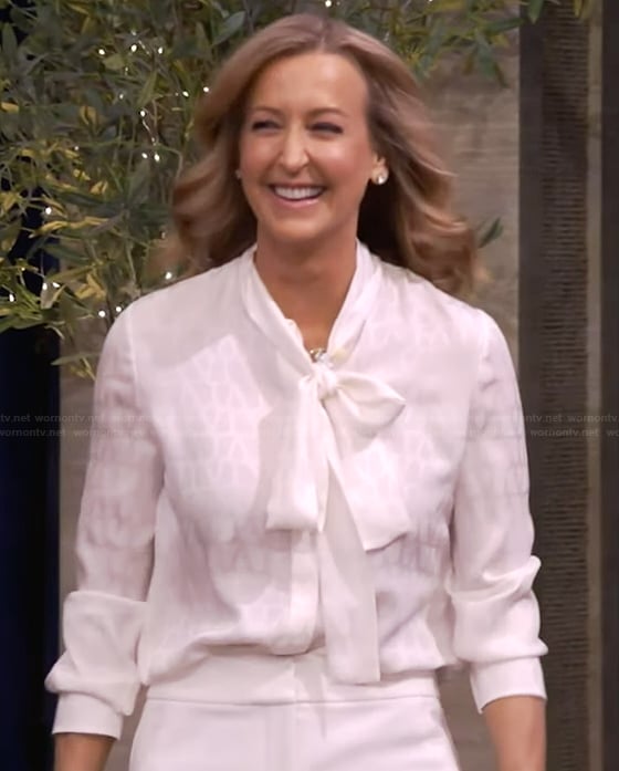 Lara Spencer’s white silk tie neck blouse on Live with Kelly and Mark