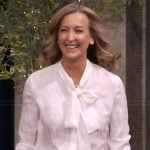 Lara Spencer’s white silk tie neck blouse on Live with Kelly and Mark