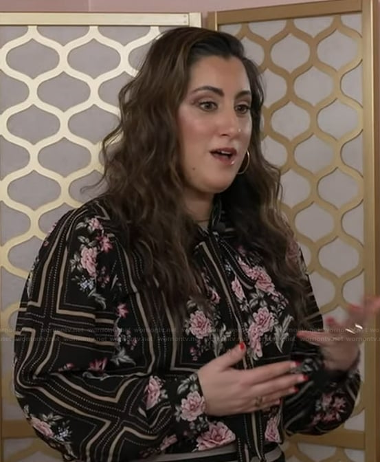 Laura Burke’s black floral print blouse on Good Morning America