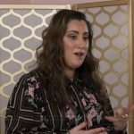 Laura Burke’s black floral print blouse on Good Morning America