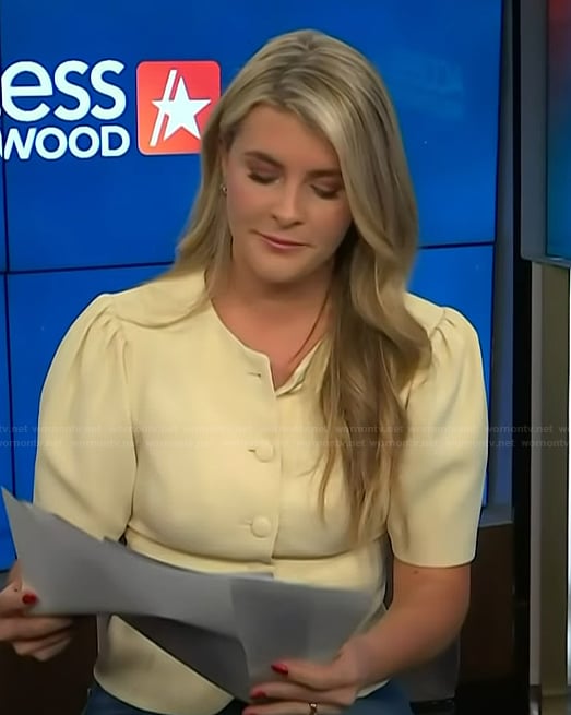 Lauren Herbert's yellow cardigan on Access Hollywood