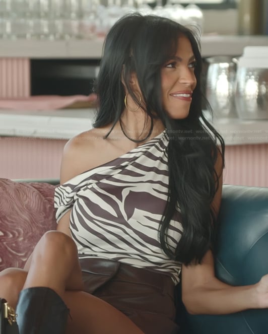 Layla’s zebra print one shoulder top on The Secret Lives of Mormon Wives