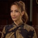 Lily's black and gold printed cross-neck dress on The Young and the Restless